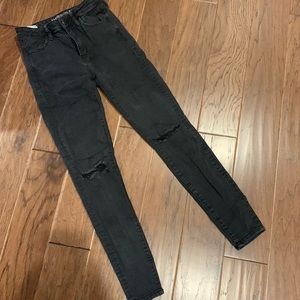American Eagle black ripped knee super Hi-rise jegging. Size 4